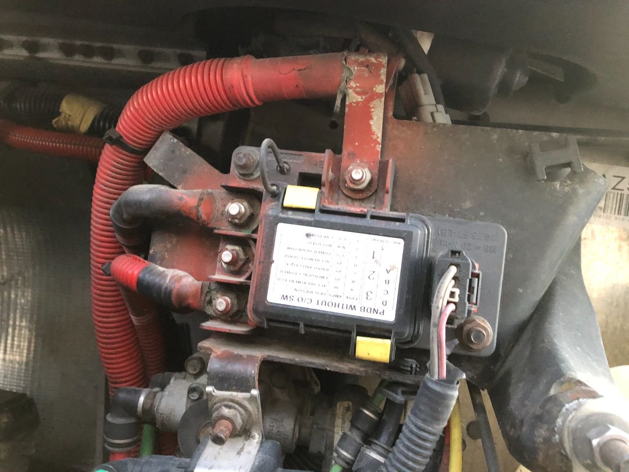 Mobile mechanic performing an electrical repair on a Peterbilt truck near Paso Robles